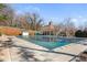 Community pool is covered for the winter with a pool house and lounge chairs at 4095 Oberon Se Ct, Smyrna, GA 30080