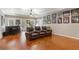 Recreation room featuring hardwood floors, wet bar, theater seating and sports decor at 4095 Oberon Se Ct, Smyrna, GA 30080