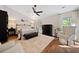 Bedroom with a large area rug, dark furniture, and natural light at 4861 Karls Gate Dr, Marietta, GA 30068