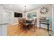 Dining area with a large window and plenty of natural light, and view to backyard at 4861 Karls Gate Dr, Marietta, GA 30068