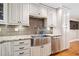 The kitchen has stainless steel appliances, granite countertops, and white cabinets at 4861 Karls Gate Dr, Marietta, GA 30068
