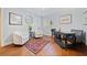Bright office featuring hardwood floors, stylish decor, and a functional desk setup at 4861 Karls Gate Dr, Marietta, GA 30068