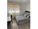 Comfortable bedroom with a large window and ample natural light at 6756 Brookwood Cir, Jonesboro, GA 30043