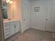 Bathroom featuring a vanity with white cabinets and tiled flooring at 1200 Bar Harbor Pl, Lawrenceville, GA 30044