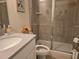 Bathroom featuring a tiled shower and granite counter tops at 1200 Bar Harbor Pl, Lawrenceville, GA 30044