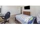 Bedroom with large desk for gaming and comfortable bed at 1263 Polk Xing, Mcdonough, GA 30252
