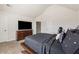 Spacious bedroom has vaulted ceiling, a TV, and an ample supply of natural light at 1263 Polk Xing, Mcdonough, GA 30252