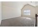 Bright bonus room has high ceilings, neutral paint, and lots of natural light at 1263 Polk Xing, Mcdonough, GA 30252
