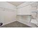 Walk-in closet featuring built-in shelving and hanging rods for maximum storage at 1263 Polk Xing, Mcdonough, GA 30252