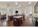 Gourmet kitchen with granite counters, stainless appliances, and hardwood floors at 1263 Polk Xing, Mcdonough, GA 30252