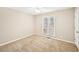 Comfortable bedroom with a large window providing natural light, creating a relaxing space at 105 Spring Forest Way, Sharpsburg, GA 30277