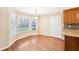 Bright breakfast nook with large windows, offering a lovely spot for morning coffee and casual meals at 105 Spring Forest Way, Sharpsburg, GA 30277
