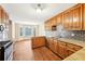 Spacious kitchen featuring stainless appliances, granite countertops, and a breakfast area, great for entertaining at 105 Spring Forest Way, Sharpsburg, GA 30277