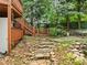 Stone steps lead to a backyard and fenced area at 4000 Wieuca Ne Rd, Atlanta, GA 30342