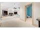Spacious bedroom with attached bathroom, skylight, and built-in shelves perfect for an office at 4000 Wieuca Ne Rd, Atlanta, GA 30342