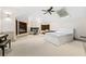 Bright bedroom with a skylight, built in shelving, and a comfortable work space at 4000 Wieuca Ne Rd, Atlanta, GA 30342
