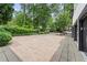 Long driveway with room to play basketball, plenty of parking space, and lush green landscaping at 4000 Wieuca Ne Rd, Atlanta, GA 30342