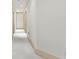 Neutral hallway featuring carpet floors, light-colored walls, and baseboard trim at 4000 Wieuca Ne Rd, Atlanta, GA 30342