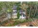 Bird's eye view showcases this beautiful home's landscaped yard, roof line, and driveway at 4000 Wieuca Rd Ne, Atlanta, GA 30342
