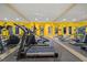 Bright home gym features ceiling fan, mirrored walls, and updated exercise equipment at 4000 Wieuca Rd Ne, Atlanta, GA 30342