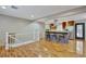 Open-concept living room with wood floors, natural light and kitchen featuring an island with seating at 7030 Cascade Palmetto Hwy, Palmetto, GA 30268