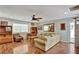 Inviting living room featuring hardwood floors, natural light, and a neutral color palette for a cozy ambiance at 7030 Cascade Palmetto Hwy, Palmetto, GA 30268