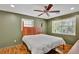 Relaxing main bedroom with hardwood floors and natural light, creating a serene and comfortable retreat at 7030 Cascade Palmetto Hwy, Palmetto, GA 30268
