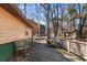 Spacious deck with wooden benches and table, perfect for enjoying the outdoor scenery at 28 East Boxwood Dr, Cartersville, GA 30121