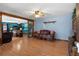 Spacious living room featuring hardwood floors, ceiling fan, and an open design at 28 East Boxwood Dr, Cartersville, GA 30121