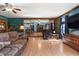 Spacious living room with hardwood flooring, wooden trim, and connecting rooms at 28 East Boxwood Dr, Cartersville, GA 30121