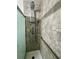 Modern shower with tile surround, rainfall shower head, and safety grab bar at 28 East Boxwood Dr, Cartersville, GA 30121