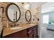 Elegant bathroom features double sinks with granite countertop and decorative tile backsplash at 3004 Westray Nw Ct, Marietta, GA 30064