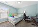 Inviting bedroom with calming blue walls, study area, and plenty of natural light at 3004 Westray Nw Ct, Marietta, GA 30064