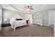 Lovely bedroom with neutral gray walls and a beautiful tray ceiling at 3004 Westray Nw Ct, Marietta, GA 30064