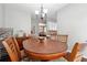 View of dining area with a wooden table and chairs and chandelier at 3004 Westray Nw Ct, Marietta, GA 30064