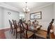 Formal dining room with elegant chandelier and large mirror at 3004 Westray Nw Ct, Marietta, GA 30064