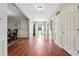 Spacious foyer with hardwood floors and elegant trim detail at 3004 Westray Nw Ct, Marietta, GA 30064