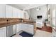 Bright kitchen with stainless steel appliances open to the Gathering room at 3004 Westray Nw Ct, Marietta, GA 30064