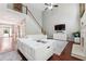 Bright living room with a high ceiling, modern decor, and open floor plan at 3004 Westray Nw Ct, Marietta, GA 30064