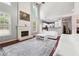 Spacious living room with a white fireplace and modern white furniture at 3004 Westray Nw Ct, Marietta, GA 30064