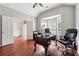 Home office with vaulted ceiling, bay window, and hardwood floors at 3004 Westray Nw Ct, Marietta, GA 30064