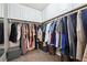Spacious walk-in closet with ample storage and built in shelving at 3004 Westray Nw Ct, Marietta, GA 30064