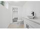 Modern bathroom with sleek vanity, vessel sink, and tile flooring at 4425 Cascade Sw Rd, Atlanta, GA 30331