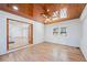 Bonus room with wood ceiling, brick accents, and ample natural light from large windows at 4425 Cascade Sw Rd, Atlanta, GA 30331