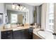 Stylish bathroom features a vanity with granite countertops, a soaking tub, and modern lighting at 57 Forsyth Nw St # 5F, Atlanta, GA 30303