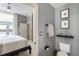 Bathroom featuring toilet, towel rack and access to bedroom at 57 Forsyth Nw St # 5F, Atlanta, GA 30303