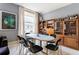 Dining room area with modern decor and natural light from a large window at 57 Forsyth Nw St # 5F, Atlanta, GA 30303
