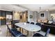 Open floor plan with a kitchen, dining area, and living room featuring stylish decor at 57 Forsyth Nw St # 5F, Atlanta, GA 30303