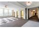 Elevator lobby with marble walls and floors, and three gold elevators at 57 Forsyth Nw St # 5F, Atlanta, GA 30303