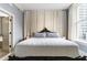 Lovely main bedroom with a luxurious bed, elegant curtains, and an ensuite bathroom at 57 Forsyth Nw St # 5F, Atlanta, GA 30303